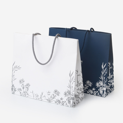 Harga yang bagus Custom Matt Glossy Laminated White Art Paper Gift Bag Dengan Genggam Untuk Belanja daring